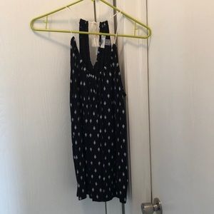 Black and white lace, tie-neck tank top.